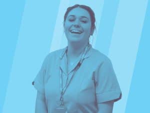 A GP practice colleague who is smiling, with a blue background.